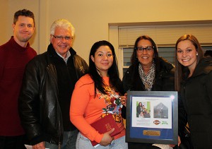 Amy North (center) with John Koleas, Mary Anne Martiny and April Rechlitz from The Harley-Davidson Foundation, and Milwaukee Habitat Executive Director Brian Sonderman